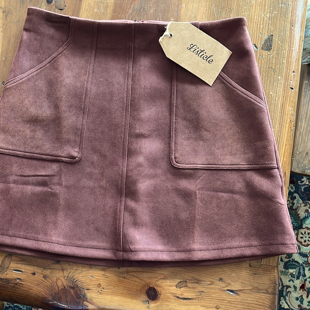 Short 16” length skirt by Listicle. New skirt with tags.  Has never been worn.